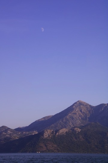 Mountains under a blue dusk sky